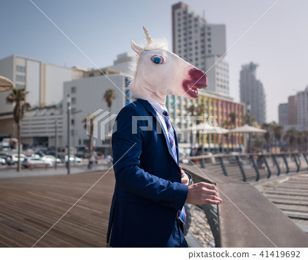 Unusual manager in funny mask Unusual manager in funny mask 41419692