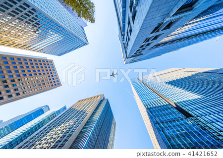 looking up view of city skyline in tokyo, japan looking up view of city skyline in tokyo, japan 41421652