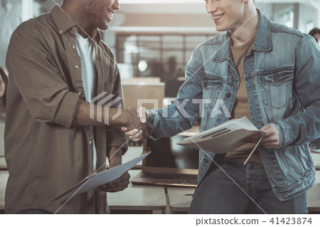 Delighted males are greeting each other 41423874