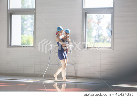 Poolside children and women Poolside children and women 41424385