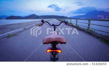 Retro bicycle with brown leather seat and handle Retro bicycle with brown leather seat and handle 41426850