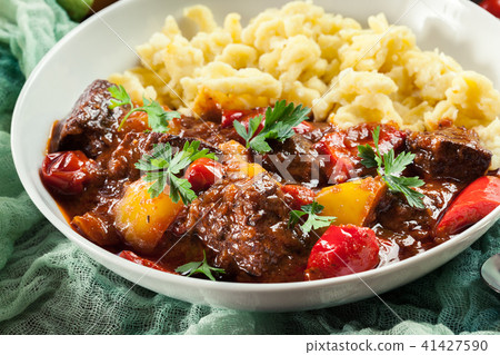 Hungarian beef goulash serwed with galuska noodles 41427590