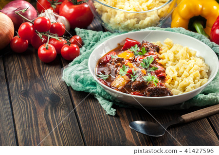 Hungarian beef goulash serwed with galuska noodles 41427596