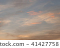 Evening blue sky with colorful clouds. 41427758