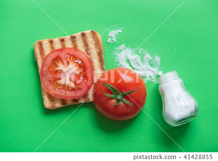 Tomatoes, salt and grilled toast 41428855