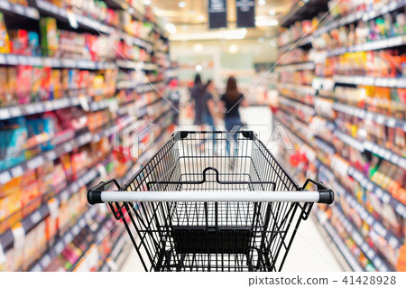 Shopping trolley in department store with goods Shopping trolley in department store with goods 41428928