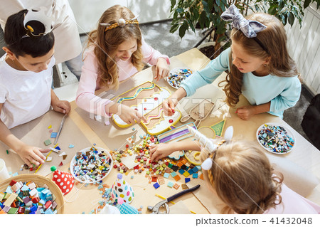 Girl birthday decorations. table setting with cakes, drinks and party gadgets. Girl birthday decorations. table setting with cakes, drinks and party gadgets. 41432048