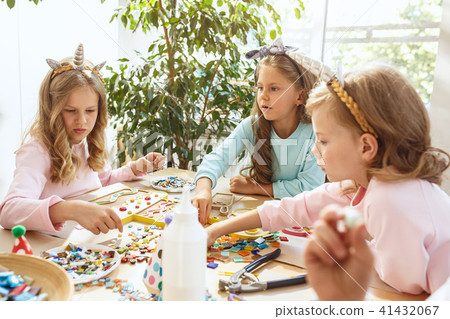 Girl birthday decorations. table setting with cakes, drinks and party gadgets. Girl birthday decorations. table setting with cakes, drinks and party gadgets. 41432067