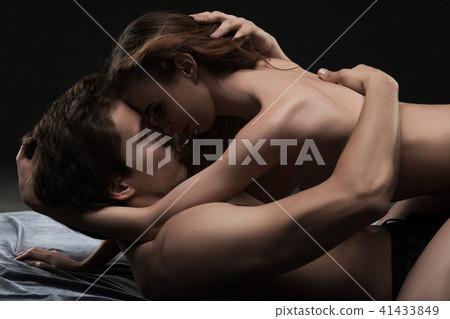 Attractive couple shot in a steamy embrace 41433849