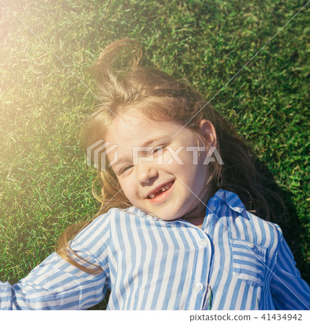 Portrait of pretty little smiling girl. 41434942