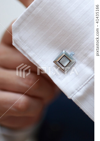 Cufflinks button (body parts no face person office worker shirt shirt title president copy space hands) 41435166