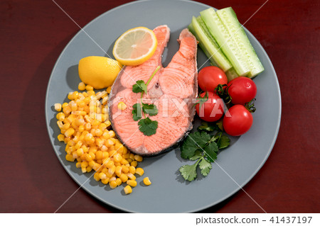 grilled fish salmon fillet with fresh vegetable 41437197