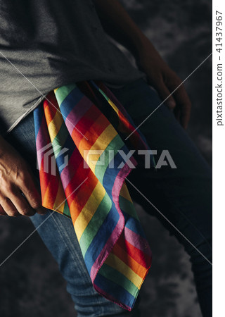 man with a rainbow-patterned handkerchief 41437967