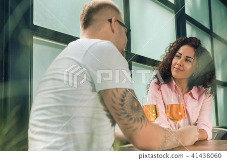 She said him yes. Closeup of young man kissing his wife hand while making marriage proposal outdoors 41438060