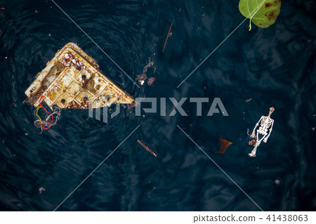 Bone doll and basket Plastic waste on the sea  41438063