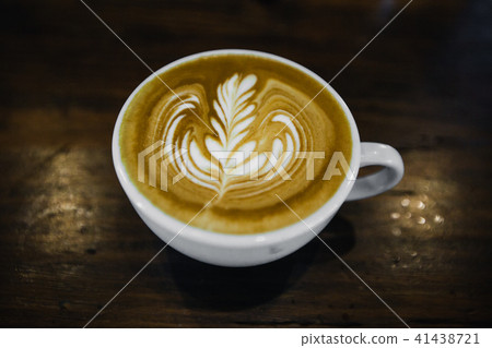 top view of Coffee cup with latte art on wooden top view of Coffee cup with latte art on wooden 41438721