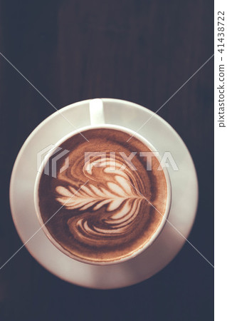 top view of Coffee cup with latte art on wooden top view of Coffee cup with latte art on wooden 41438722