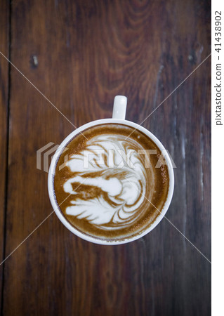 top view of Coffee cup with bird latte art top view of Coffee cup with bird latte art 41438902