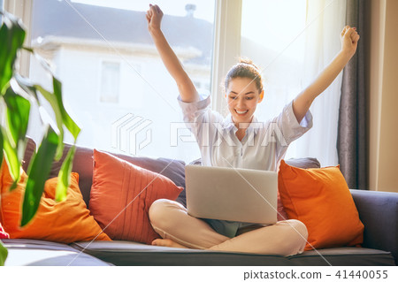 woman working on a laptop woman working on a laptop 41440055