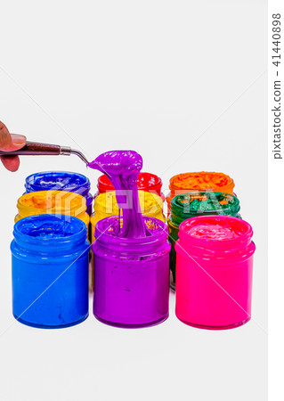 Use trowel scoop purple color from the can. Use trowel scoop purple color from the can. 41440898