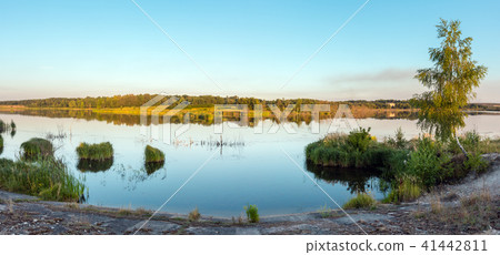 Evening summer lake landscape. Evening summer lake landscape. 41442811