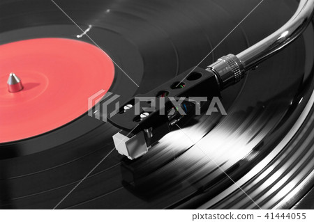 Record player playing vinyl Record player playing vinyl 41444055