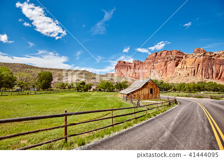 Old barn by a road. Old barn by a road. 41444095