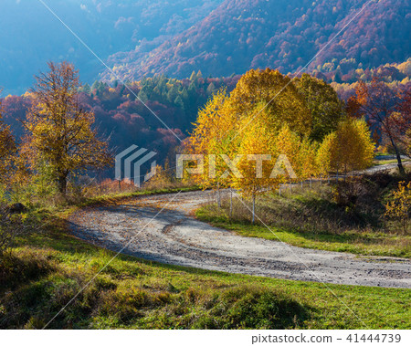 Dirty secondary road in autumn Carpathian mountain Dirty secondary road in autumn Carpathian mountain 41444739