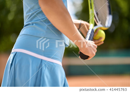 Sportive girl plays tennis Sportive girl plays tennis 41445763