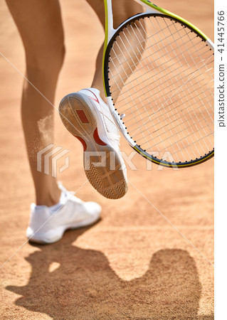 Sportive girl plays tennis Sportive girl plays tennis 41445766