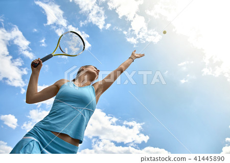 Sportive girl plays tennis Sportive girl plays tennis 41445890