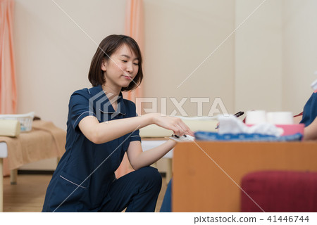 A woman in an interview nurse clothes A woman in an interview nurse clothes 41446744
