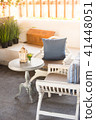 White vintage wooden table and chair in sunlight 41448051