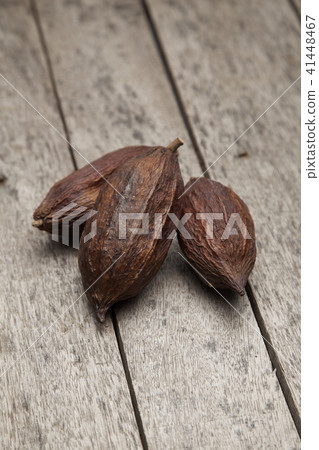 cocoa fruit on rustic wooden background cocoa fruit on rustic wooden background 41448467