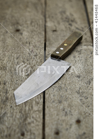Kitchen knife on wooden background Kitchen knife on wooden background 41448468
