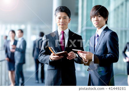 Male business image of businessman suits showing conversation 41449281