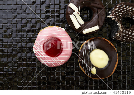 donuts with sprinkles and frosting donuts with sprinkles and frosting 41450119