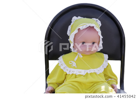 Children's toys: doll on chair on white background. Children's toys: doll on chair on white background. 41455042
