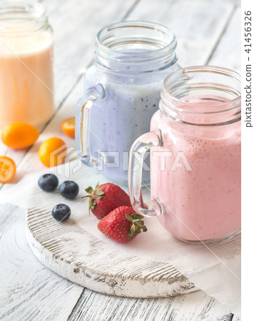 Berry smoothies on the wooden board 41456326