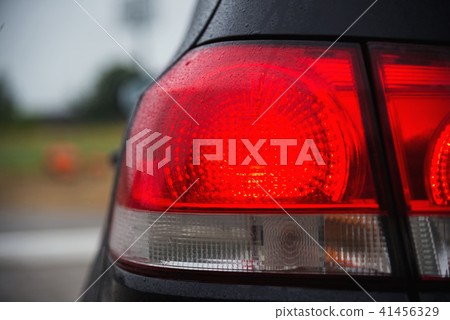 Black sports hatchback car rear light after coseup 41456329