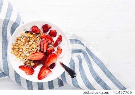 Healthy breakfast with granola and strawberry. 41457769