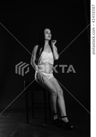 Young beautiful woman in a fashionable linen luxury brunette in the Studio. 41458387