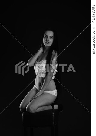 Young beautiful woman in a fashionable linen luxury brunette in the Studio. Young beautiful woman in a fashionable linen luxury brunette in the Studio. 41458395