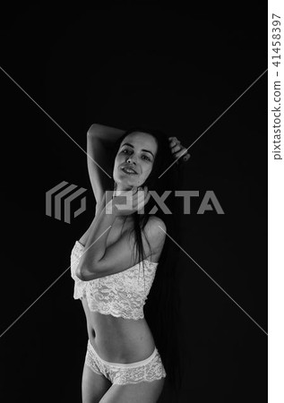 Young beautiful woman in a fashionable linen luxury brunette in the Studio. 41458397