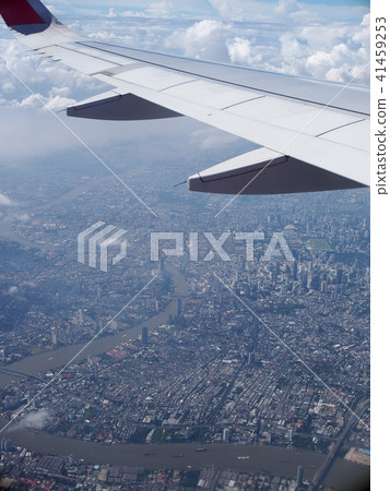 crop view of a white silver metallic airplane wing crop view of a white silver metallic airplane wing 41459253