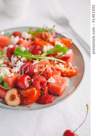 Summer salad with fruits and vegetables Summer salad with fruits and vegetables 41461892