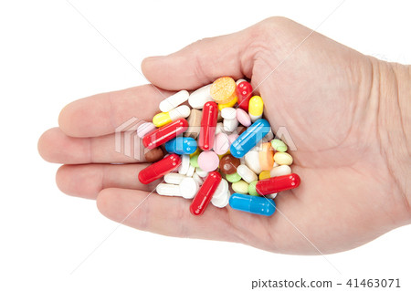Pills, capsules in hand on white. Medicines drugs. Pills, capsules in hand on white. Medicines drugs. 41463071