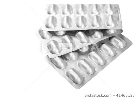 Pills in blister packs on white background. Pills in blister packs on white background. 41463153
