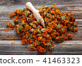 Dried calendula flowers on wooden Medicinal plants 41463323