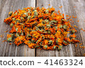 Dried calendula flowers on wooden Medicinal plants 41463324